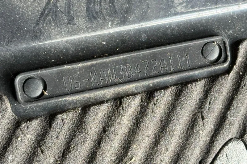 Slide: The Image of VIN plate on 2011 Kawasaki Ultra 300 X Jet Ski, showing serial number. - 7