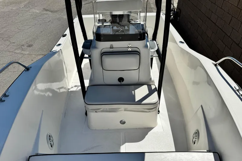 Slide: The Image of 2019 Thresher 19 CC boat interior with center console and seating. - 9