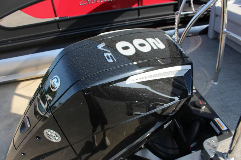 Slide: The Image of 2025 Barletta Aria 24UC boat with a V6 engine, close-up view. - 11