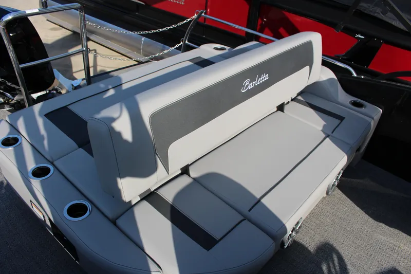 Slide: The Image of 2025 Barletta Aria 24UC boat seating with cup holders and sleek design. - 7