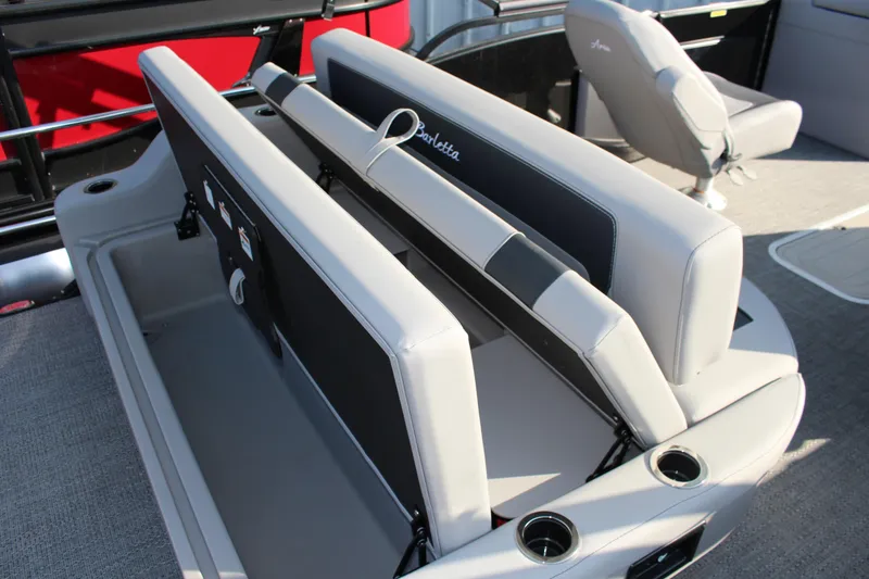 Slide: The Image of 2025 Barletta Aria 24UC boat interior with adjustable seating and cup holders. - 8