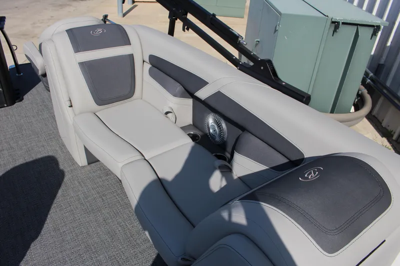 Slide: The Image of 2025 Barletta Cabrio 22CC boat interior with luxurious gray seating and stylish design. - 12