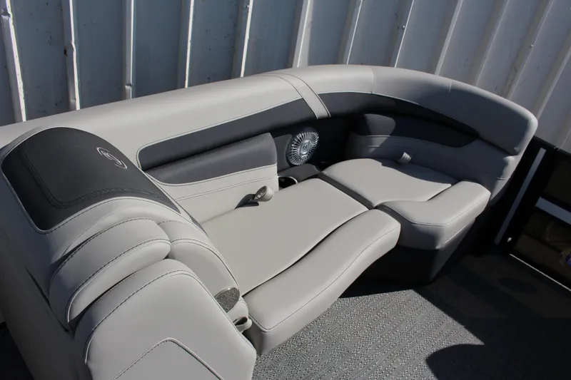 Slide: The Image of 2025 Barletta Cabrio 22CC boat interior with luxurious gray seating and modern design. - 9