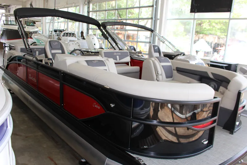 The Image of 2025 Barletta Cabrio 24UE pontoon boat with sleek design and luxurious seating. - 1