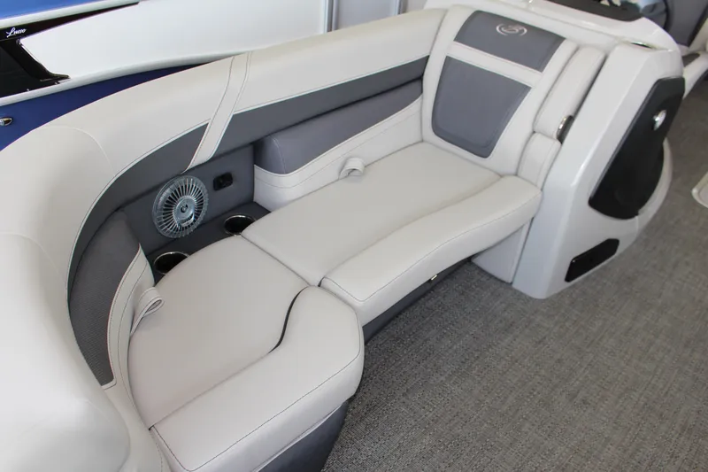 Slide: The Image of Luxurious seating in the 2025 Barletta Cabrio 24UE pontoon boat interior. - 5