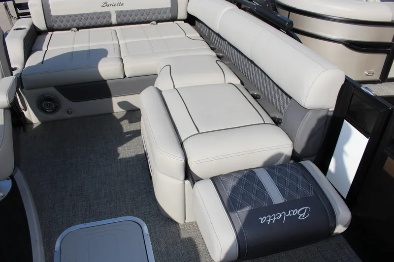 Slide: The Image of 2025 Barletta Lusso 23U interior with luxurious seating and elegant design. - 11