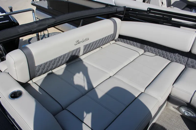 Slide: The Image of 2025 Barletta Lusso 23U boat interior with luxurious seating and elegant design. - 8