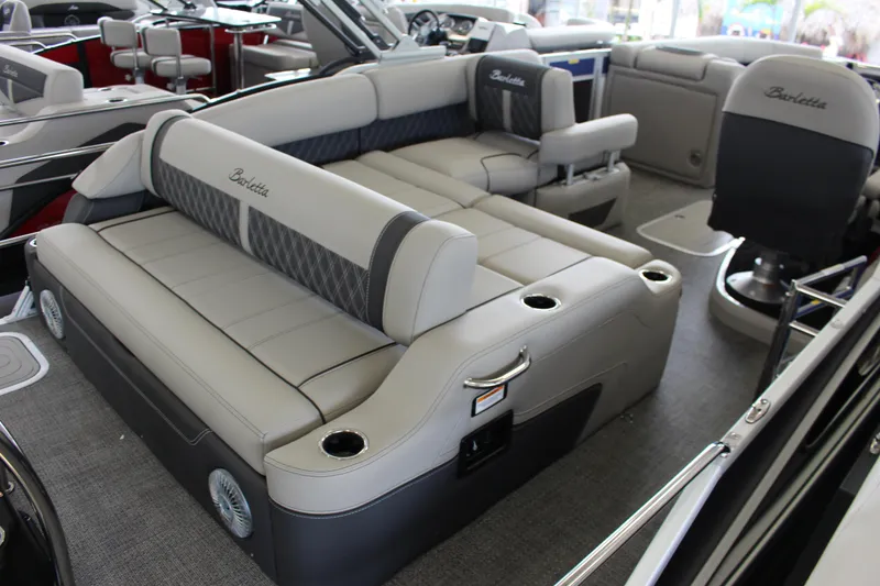 Slide: The Image of 2025 Barletta LUSSO 25U pontoon boat interior with luxurious seating and modern design. - 10