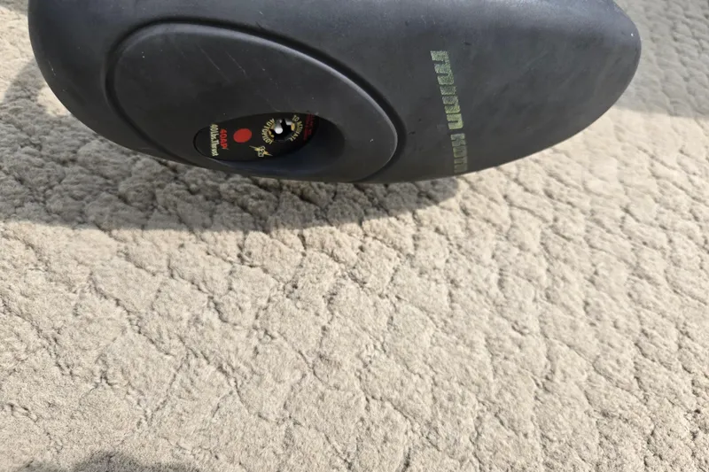 Slide: The Image of Close-up of a Suncruiser Trinidad 204 boat part on textured carpet. - 27