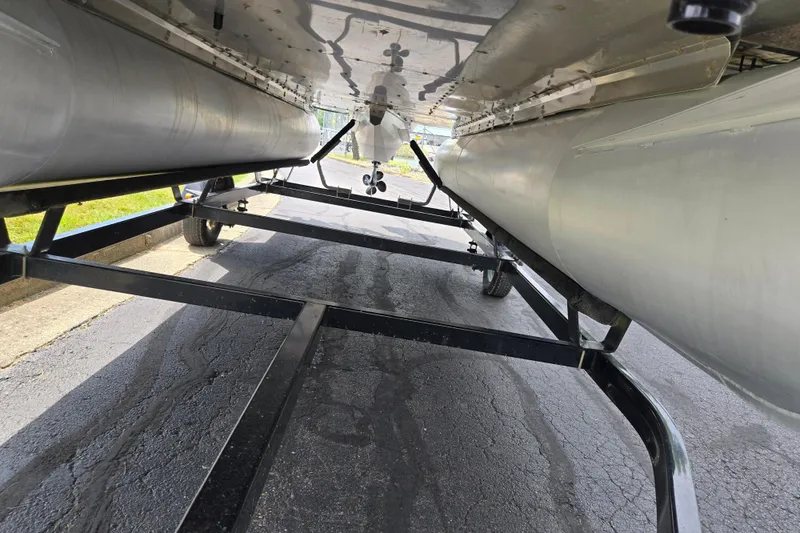 Slide: The Image of Underneath view of a 2007 Suncruiser Trinidad 204 pontoon boat on a trailer. - 7