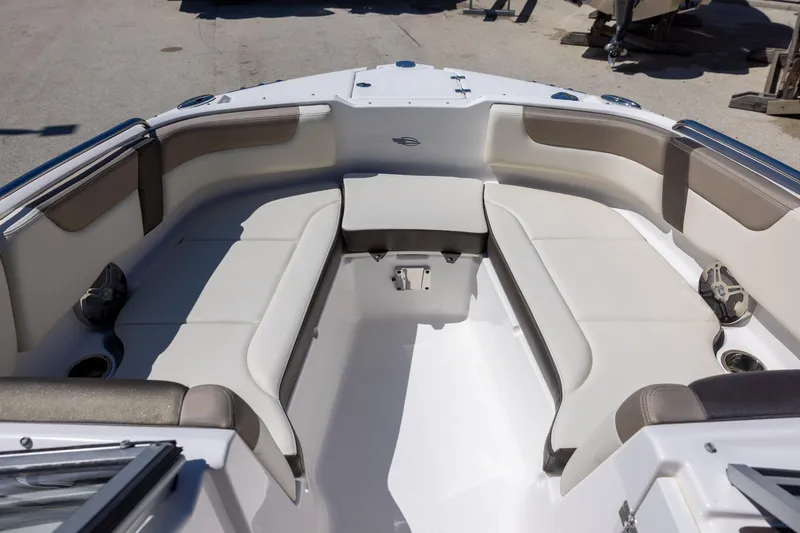 Slide: The Image of 2019 Chaparral 230 Suncoast boat interior with spacious seating and modern design. - 13
