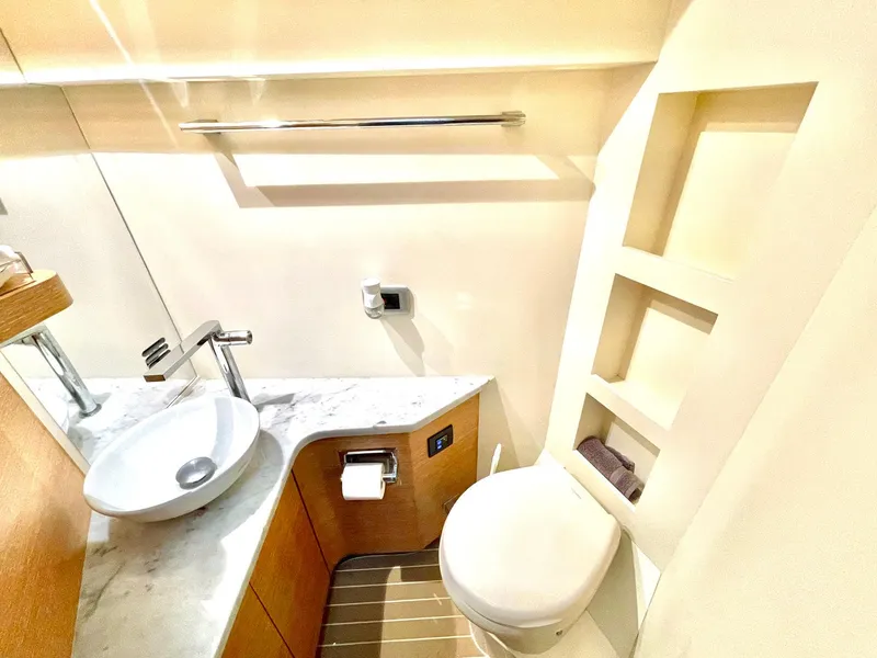 Slide: The Image of Luxurious bathroom in 2020 Scout 530 LXF yacht with modern fixtures and elegant design. - 12