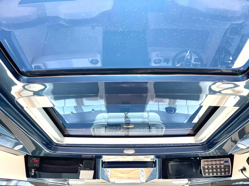 Slide: The Image of Interior view of 2020 Scout 530 LXF boat, featuring sleek design and modern controls. - 21