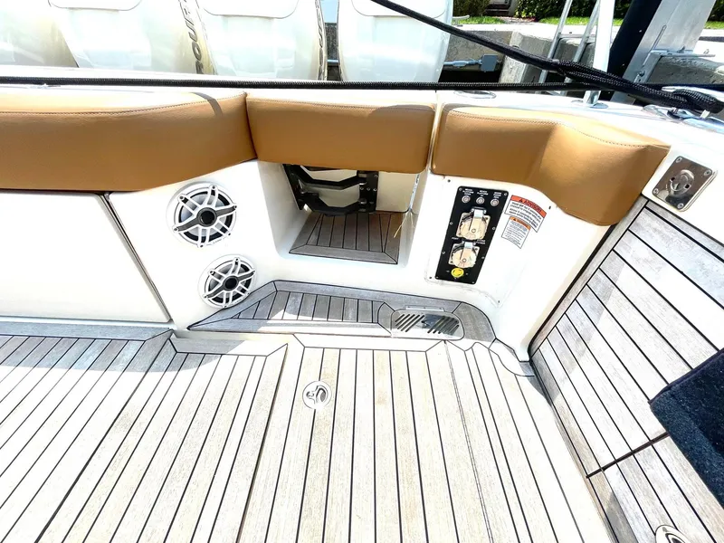 Slide: The Image of 2020 Scout 530 LXF boat deck with speakers and control panel. - 33
