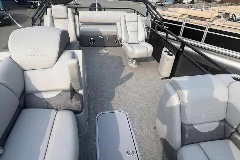 Slide: The Image of 2025 Regency 250 DL3 pontoon boat interior with luxurious seating and modern design. - 12