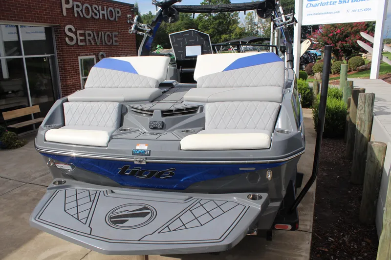 Slide: The Image of 2022 Tigé Z3 boat displayed at Charlotte Ski Boats dealership. - 4