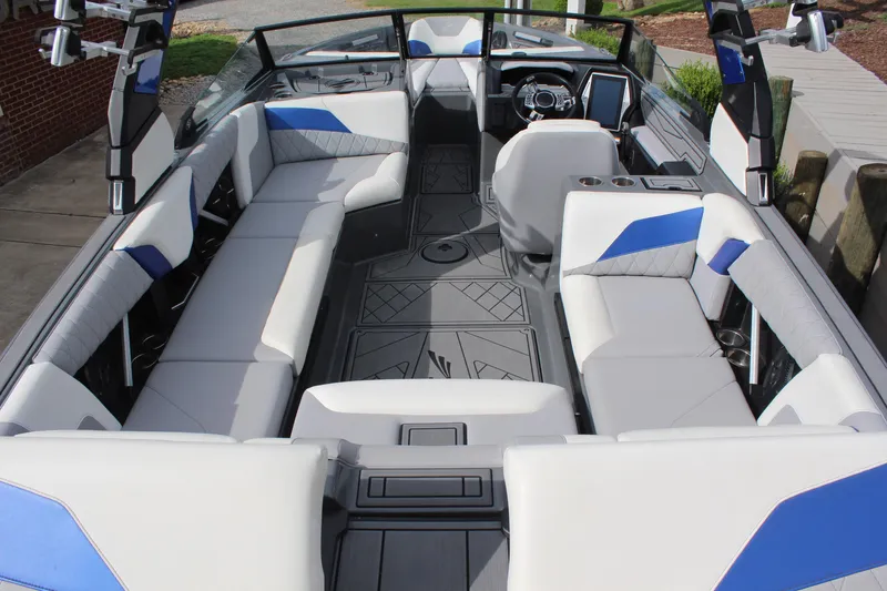 Slide: The Image of 2022 Tigé Z3 boat interior with modern seating and sleek design. - 9