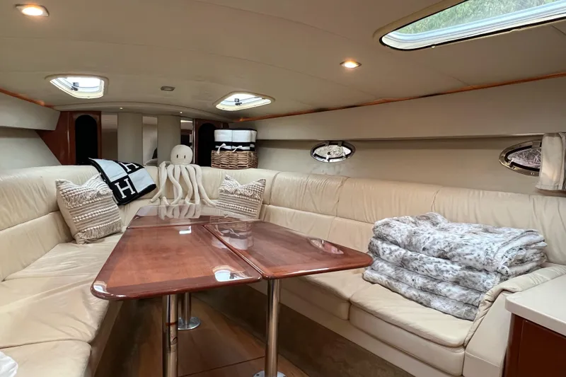Slide: The Image of Luxurious interior of a 2011 Formula 400 Super Sport yacht with plush seating and elegant decor. - 16