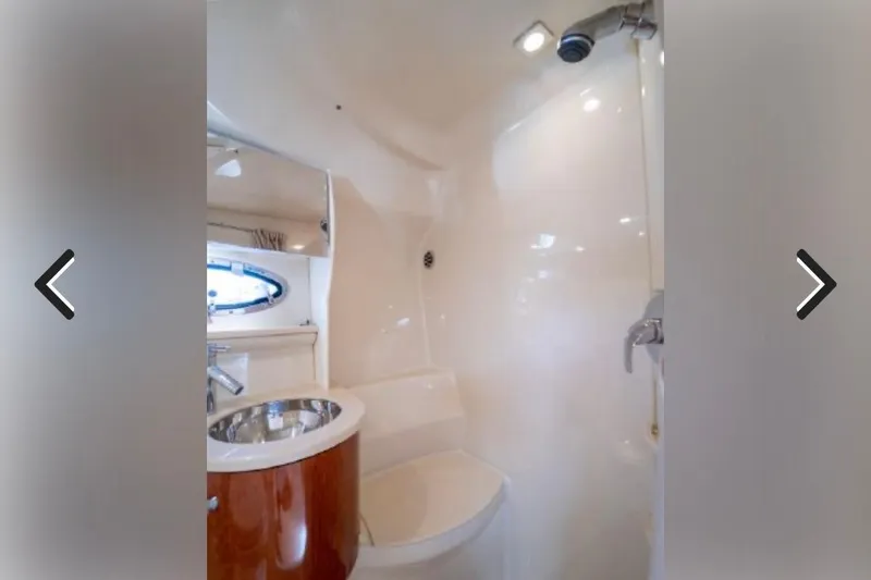 Slide: The Image of Interior of 2011 Formula 400 Super Sport yacht bathroom with sink and shower. - 23
