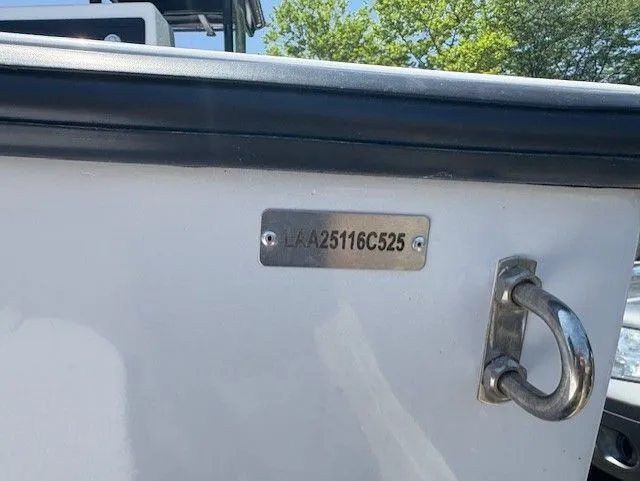 Slide: The Image of 2025 Latitude Tournament Boats 25, hull identification number plate, sunny day background. - 17