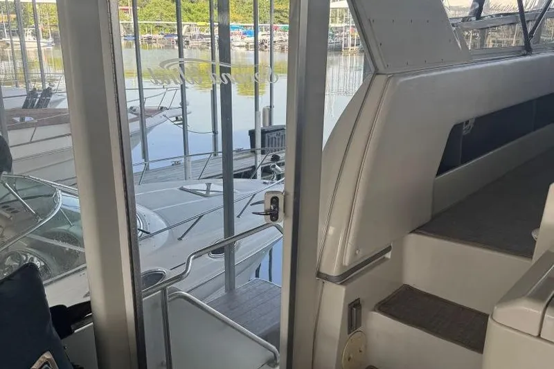 Slide: The Image of Interior view of 1998 Carver 405 Motor Yacht, docked at marina. - 18