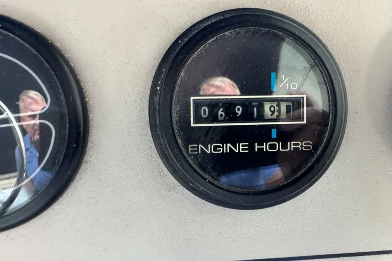 Slide: The Image of Close-up of 1998 Carver 405 Motor Yacht engine hour meter showing 691.9 hours. - 28