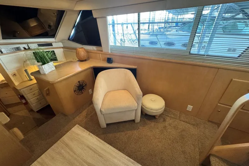 Slide: The Image of Luxurious interior of 1998 Carver 405 Motor Yacht with plush seating and elegant decor. - 35