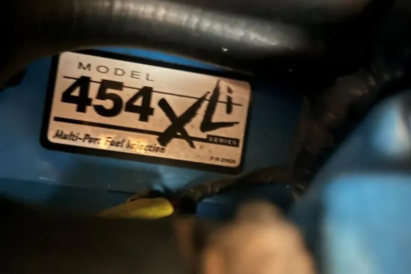 Slide: The Image of 1998 Carver 405 Motor Yacht engine label, Model 454 XL, Multi-Port Fuel Injection. - 62