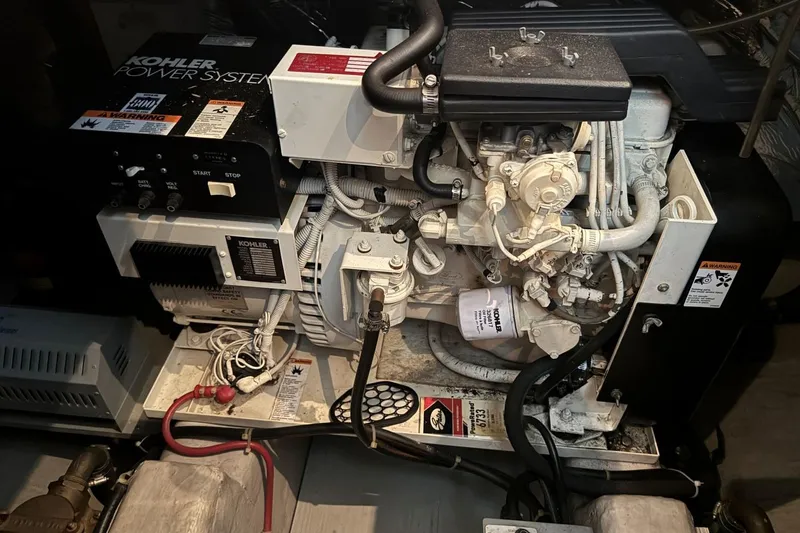 Slide: The Image of Kohler power system in 1998 Carver 405 Motor Yacht engine room. - 63