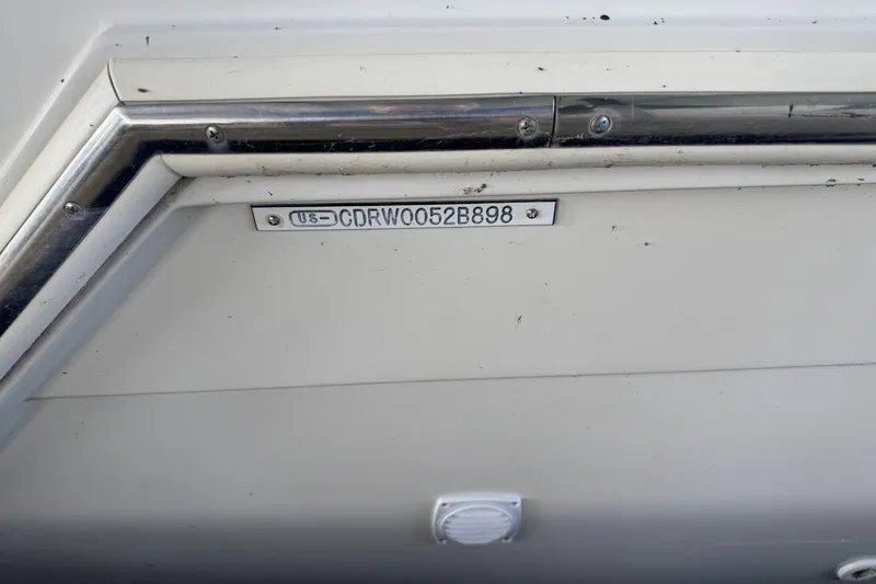 Slide: The Image of 1998 Carver 405 Motor Yacht hull identification number plate. - 9