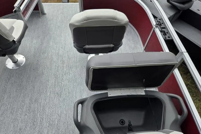Slide: The Image of 2026 Sun Tracker BB 16 XLS boat interior with seating and storage compartment. - 13