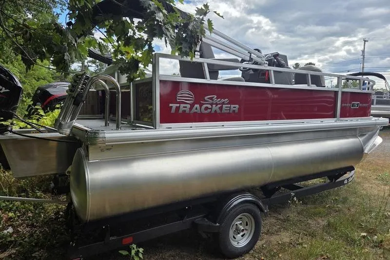 Slide: The Image of 2026 Sun Tracker BB 16 XLS pontoon boat on trailer, parked outdoors. - 4