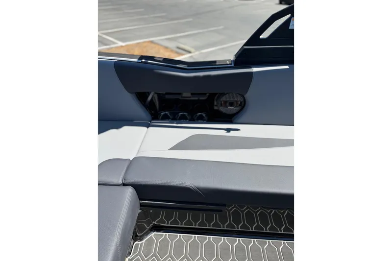 Slide: The Image of Interior view of 2025 MasterCraft NXT22 boat, featuring sleek seating and modern design elements. - 15