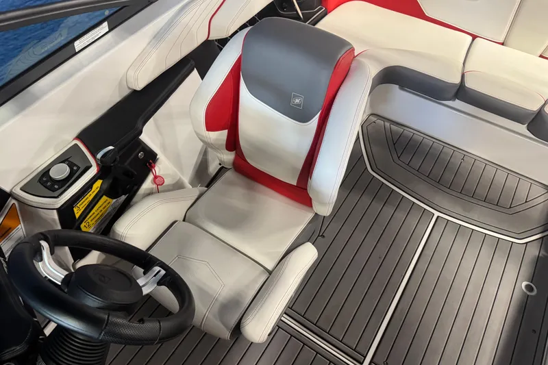 Slide: The Image of 2019 Nautique Super Air Nautique GS20 interior with sleek seating and modern controls. - 13