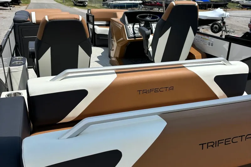 Slide: The Image of Interior of 2026 Trifecta 23 ULE SS boat with stylish seating and modern design. - 10
