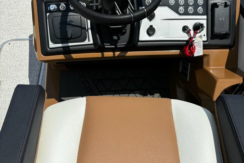 Slide: The Image of Interior view of 2026 Trifecta 23 ULE SS boat dashboard and seating. - 12