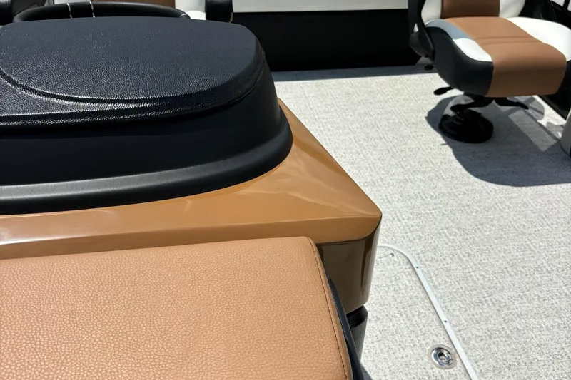 Slide: The Image of Interior of 2026 Trifecta 23 ULE SS boat with tan and black seating. - 7