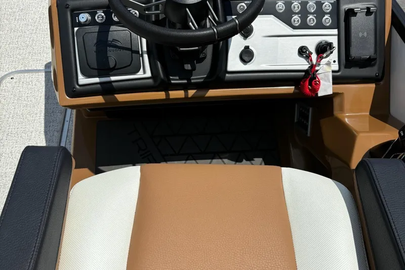 Slide: The Image of Interior view of 2026 Trifecta 23 ULE SS boat dashboard and steering wheel. - 8