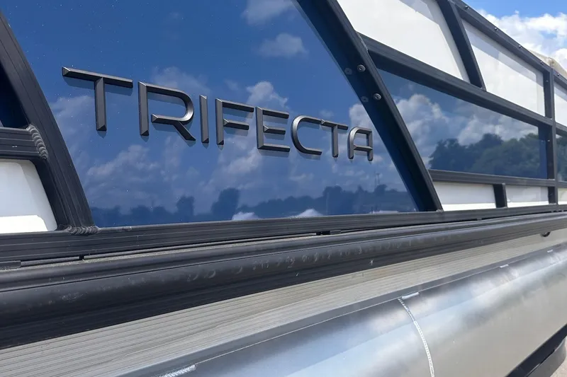 Slide: The Image of 2026 Trifecta 23 ULE SS boat with sleek design and reflective surface. - 4