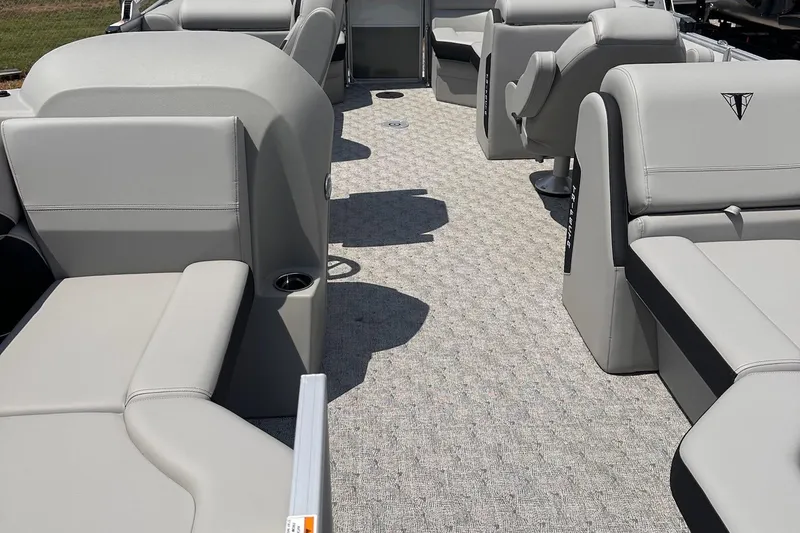 Slide: The Image of Interior of 2026 Trifecta 22 RF LE pontoon boat with gray seating and carpet. - 4