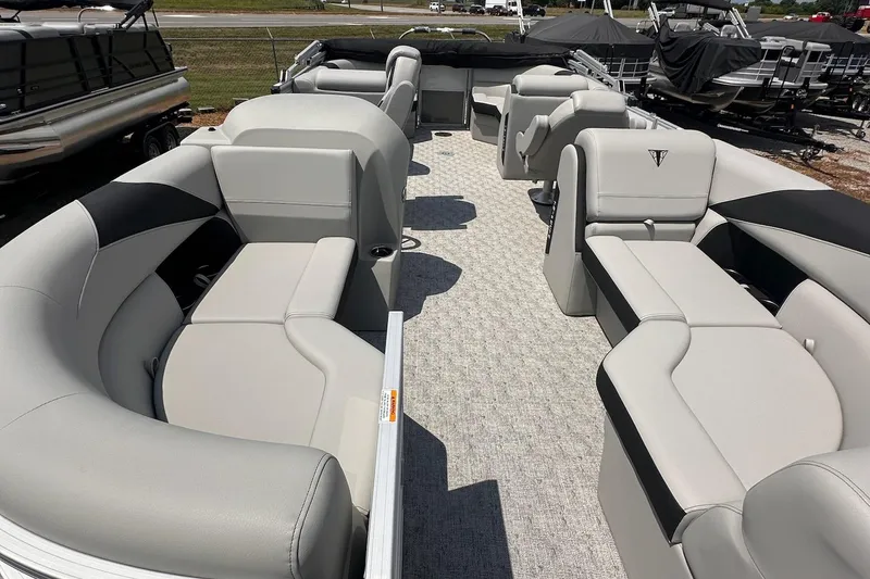 Slide: The Image of 2026 Trifecta 22 RF LE pontoon boat interior with luxurious seating and modern design. - 7