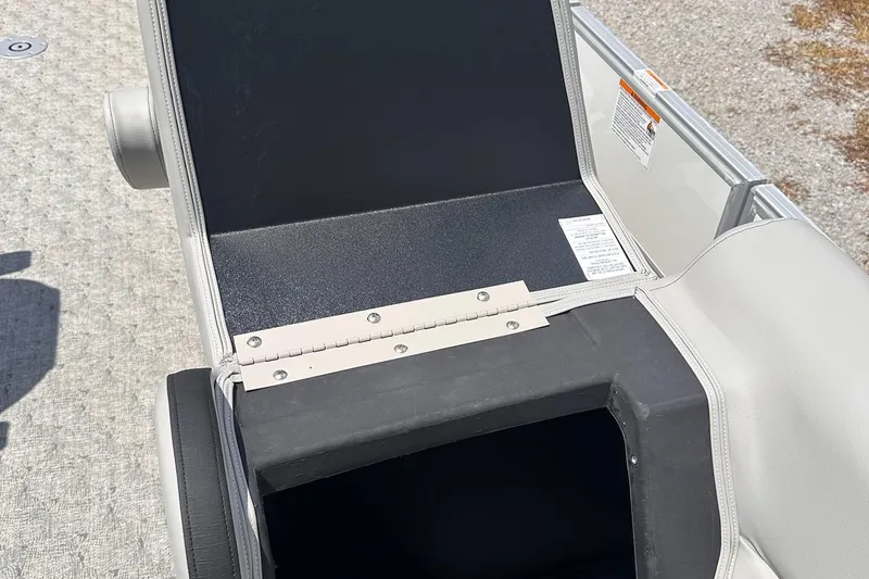 Slide: The Image of Open storage compartment on 2026 Trifecta 22 RF LE boat, featuring durable materials and sleek design. - 8