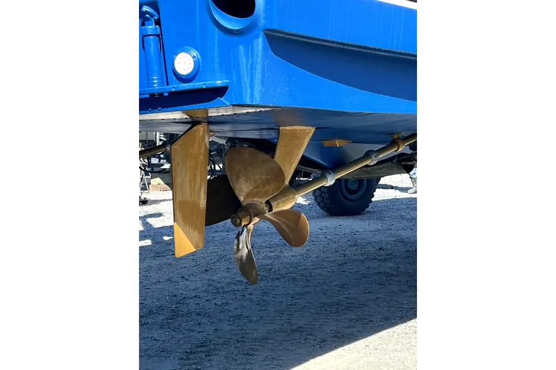 Slide: The Image of Propeller and rudder of 2004 Ocean Yachts 43 Super Sport, displayed on dry land. - 37