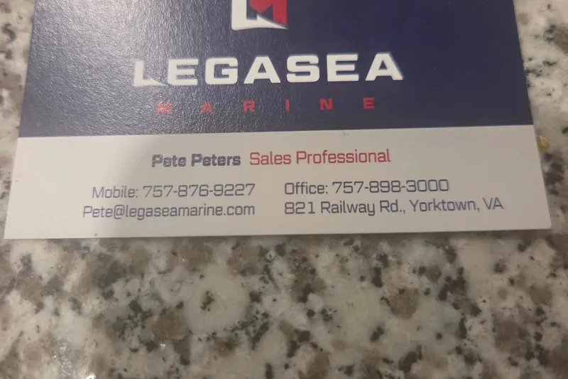 Slide: The Image of Business card for Legasea Marine, featuring contact details for a sales professional. - 38
