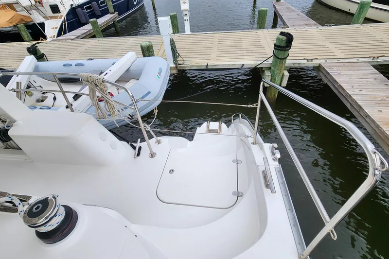 Slide: The Image of Antares 44GT 2019 yacht docked with inflatable boat, marina view. - 17