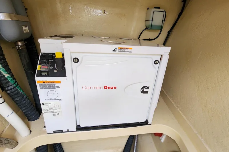 Slide: The Image of Cummins Onan generator in 2019 Antares 44GT boat engine room. - 25