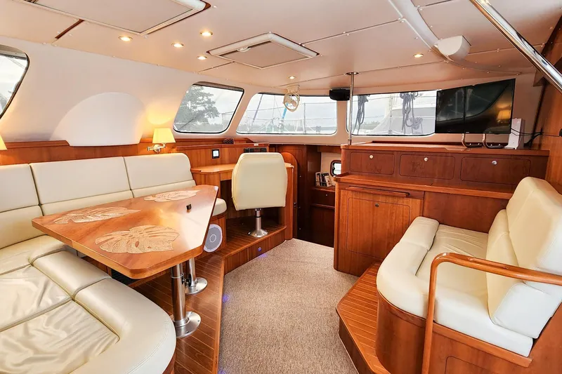 Slide: The Image of Luxurious interior of 2019 Antares 44GT yacht with elegant wood and leather furnishings. - 28