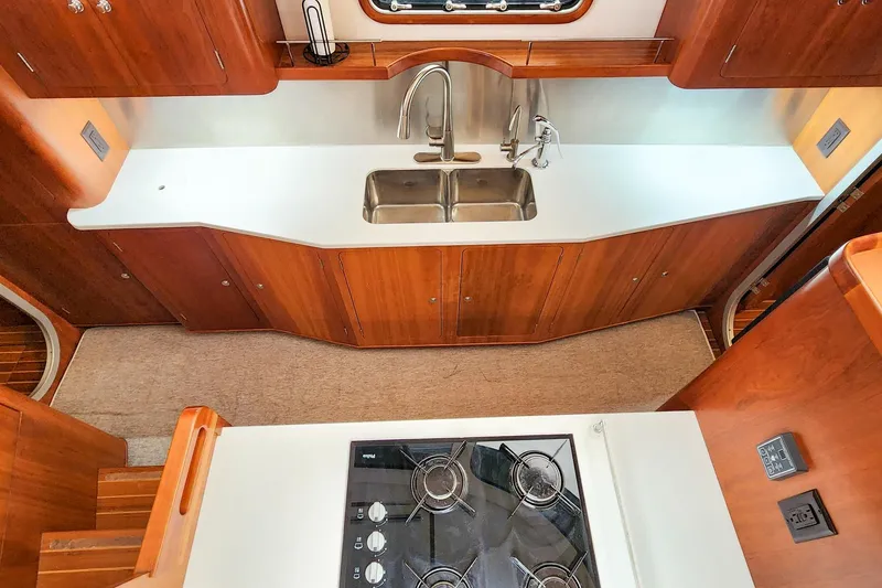 Slide: The Image of Modern kitchen interior of 2019 Antares 44GT yacht with stove and sink. - 31