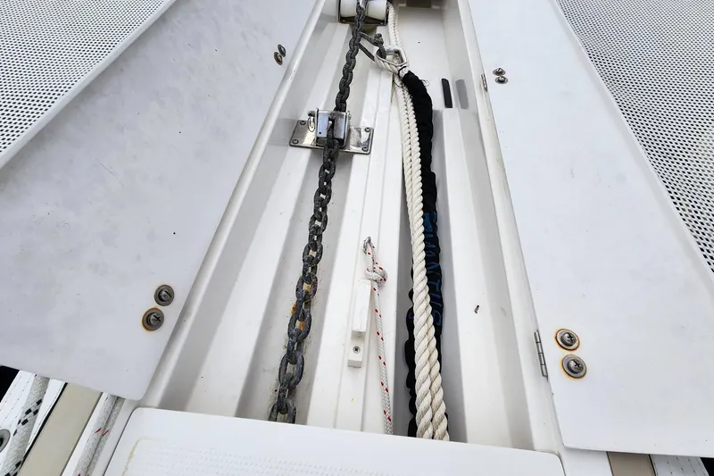 Slide: The Image of Anchor chain and rope storage on 2019 Antares 44GT boat deck. - 8