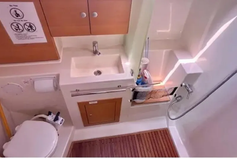 Slide: The Image of Bathroom interior of 2007 Hanse 400 yacht with sink, toilet, and shower. - 15